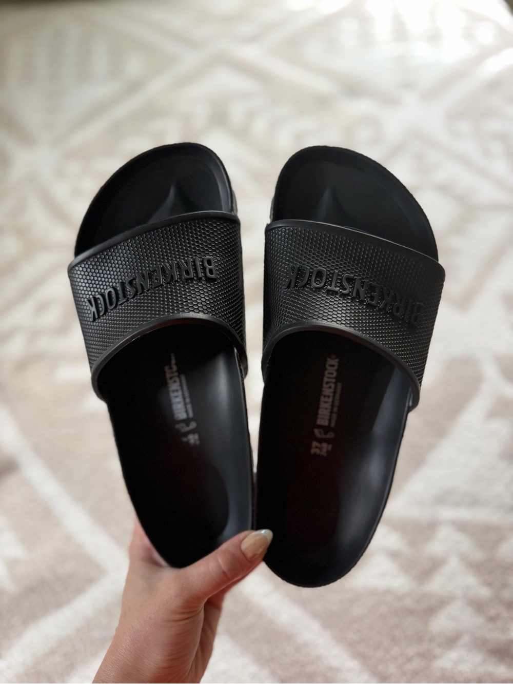 Birkenstock Black Slide Sandals with Embossed Logo